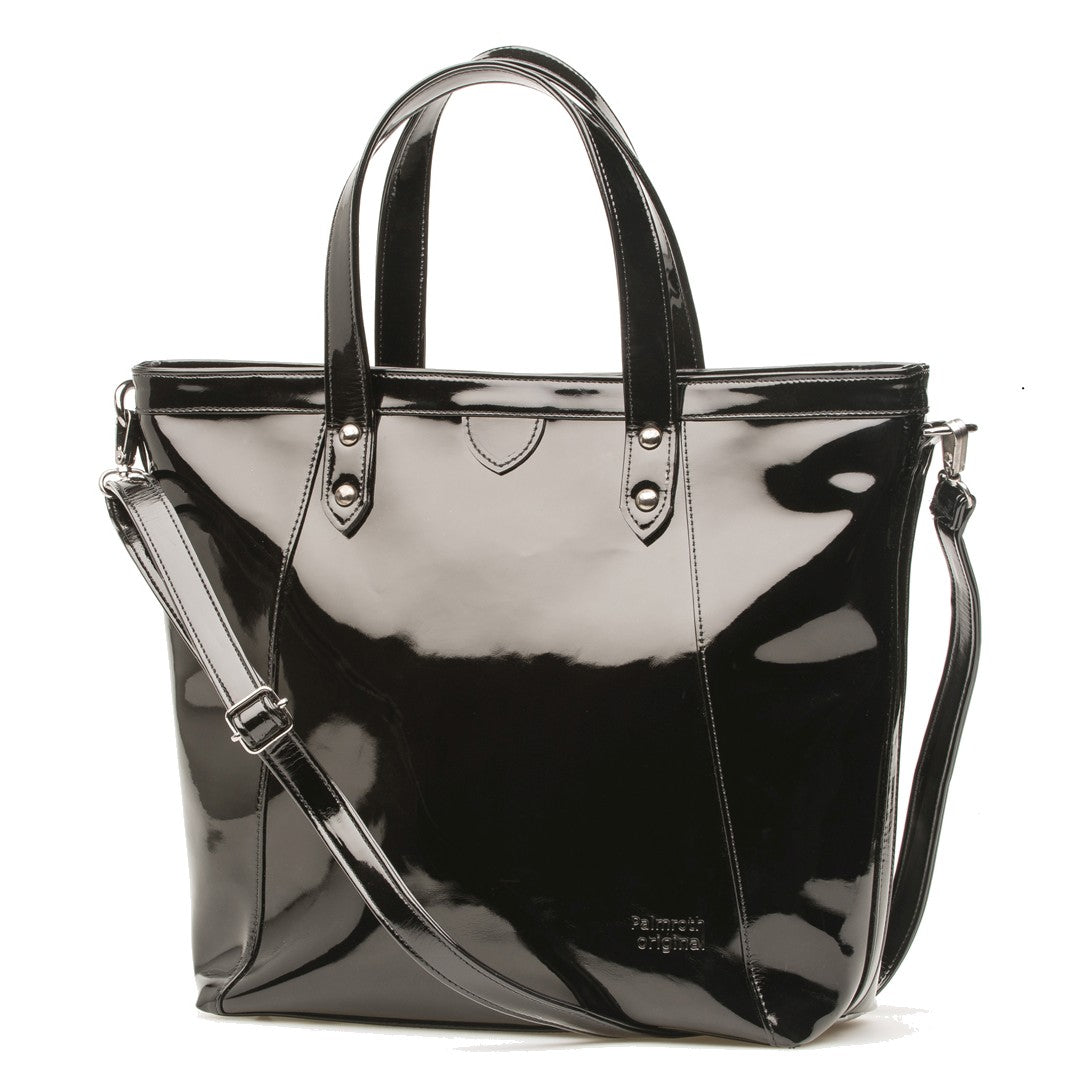 Leather goods: Patent leather handbag, in its protective…